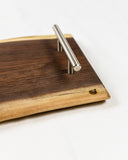 These Walnut Live Edge Serving Trays are the perfect choice when serving your favorite charcuterie on a beautiful wood tray. Each piece is unique, showing the grain patterns to create true art straight from nature.