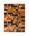 This end grain cutting board features a rich and colorful combination of exotic hardwoods in a unique random pattern.