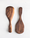 The curved sides of this wooden rice scoop, along with the short handle help you have more control when serving a bowl of rice.